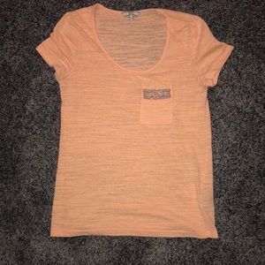 Orange jeweled pocket BKE T-shirt